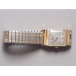 A gentleman's 14ct gold cased Hamilton wristwatch with silvered dial and Arabic numerals, on later
