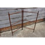 An Edwardian mahogany two-section folding towel rail, 44" wide x 40" high overall, and a two-section