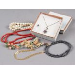 A 9ct gold bracelet, a red coral bead necklace and matching ear studs, and various other jewellery