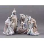 A LLadro Nativity group, Mary, Joseph and Jesus, 10" high, and three Lladro figures, the three