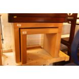 A pair of oak nesting low occasional tables, 24" wide x 14" deep x 18" high
