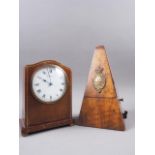 A French mahogany cased mantel clock with line inlay, white enamel dial and Roman numerals, dial