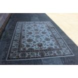 A John Lewis floral decorated rug on a natural ground, 96" x 66" approx