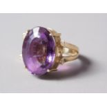 An 18ct gold, amethyst and diamond dress ring, size P, 11.4g