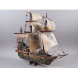 A wooden model of a Portuguese 16th century galleon 19 1/2" long x 18" high