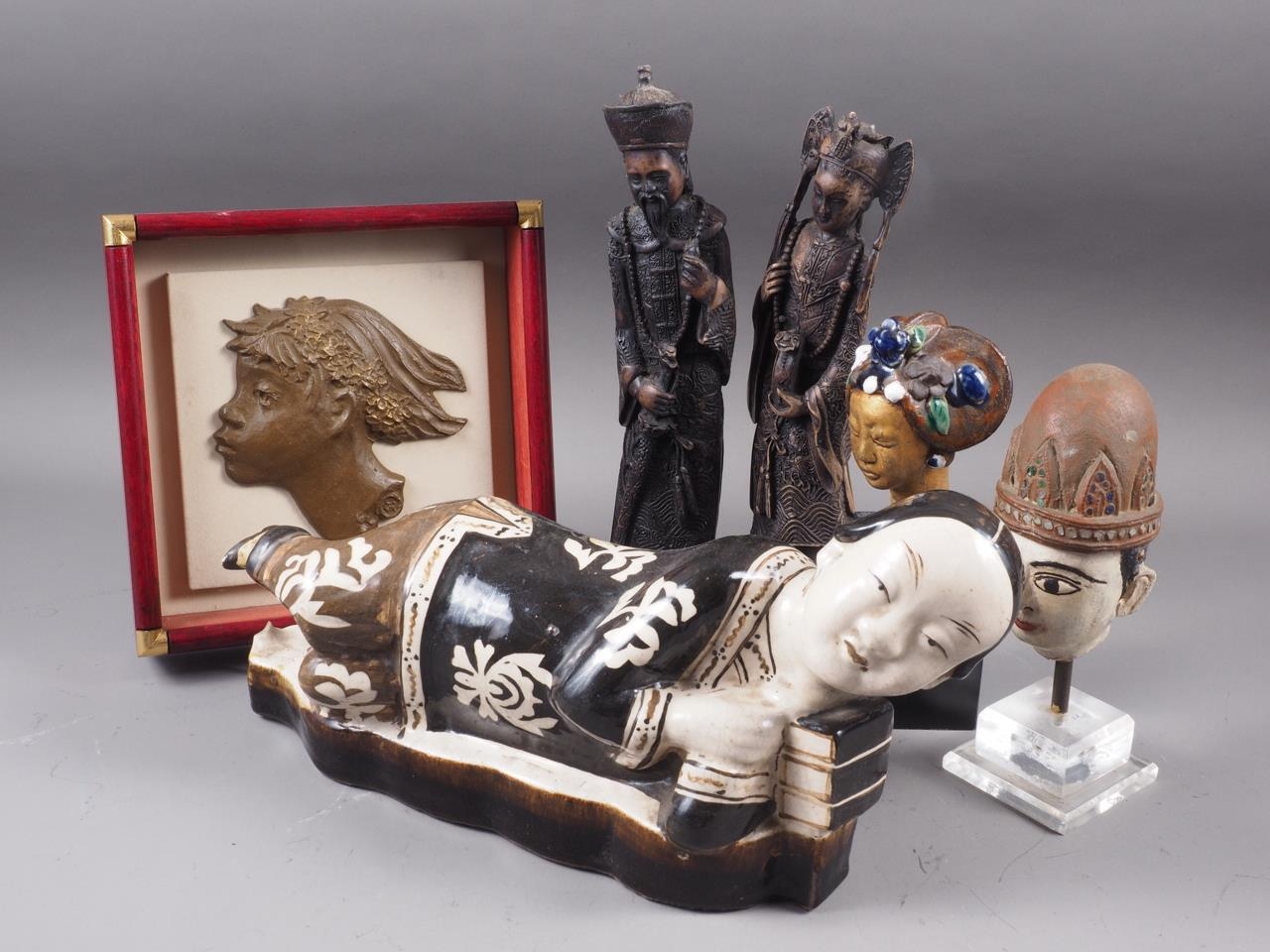 A Chinese pottery reclining figure, 14 1/4" long, two resin figures, two busts and a plaque