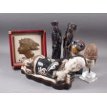 A Chinese pottery reclining figure, 14 1/4" long, two resin figures, two busts and a plaque