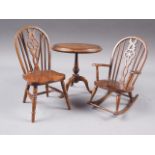 A miniature elm Windsor wheel rocking chair, 5 3/4" high, a similar Windsor wheelback chair, 6 1/