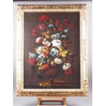 Saves: an early 20th century oil on canvas, still life of flowers in a vase, 31 1/4" x 23", in