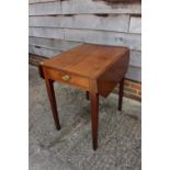A mahogany octagonal top Pembroke table, fitted one drawer, on square taper supports, 27" wide