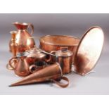 A quantity of metalware, including a copper planter, two copper kettles, a pair of copper and pewter