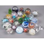 A number of glass paperweights