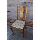 A 1930s walnut, ebony and burr walnut inlaid splat back side chair with padded seat, on cabriole