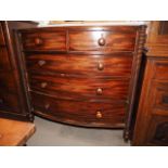 A 19th century mahogany and line inlaid bowfront chest of two short and three long graduated drawers
