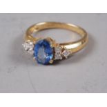 An 18ct gold, sapphire and diamond cluster ring, size O, 4.4g