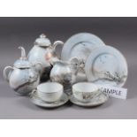 A Japanese eggshell teaset with landscape decoration, forty-five pieces approx