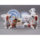 A pair of Staffordshire dogs, 8 1/4" high, a similar pair of sheep, a pair of Continental baskets,