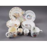 Six pieces of Royal Doulton Bunnykins china, five pieces of Wedgwood Peter Rabbit china and two