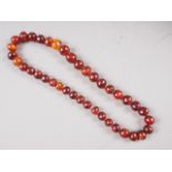 An amber necklace, 139g