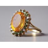 An 18ct gold, citrine, peridot and diamond dress ring, size N/O, 6.2g