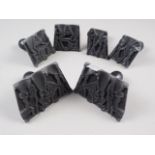 Three metal lead soldier moulds with ebonised handles