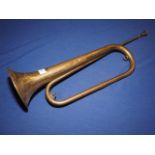 A brass bugle, 23 1/2" long