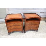 A pair of Theodore Alexander cherrywood and burr walnut banded inverse bowfront bedside cabinets,