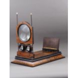 A large stereoscope (graphoscope) with magnifying lens and twin lenses for viewing stereocards,