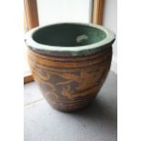 A pottery slip decorated plant pot, 17" dia x 16 1/2" high