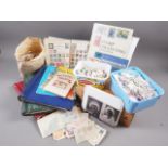 A quantity of stamps from around the world, some loose, stock books and albums, and approximately