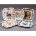 A collection of seventeen Mason's ironstone sandwich plates of different designs