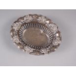 A silver chestnut basket with embossed floral decoration, 10" wide, 8.4oz troy approx