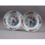 A pair of Chinese Imari palette plates with building in a landscape decoration, 8 3/4" dia
