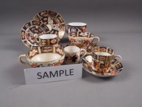 A quantity of Imari pattern china, including a pair of Davenport coffee cups, Royal Crown derby