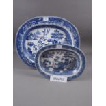Ten blue and white willow pattern platters, including a Wedgwood Etruria platter, 14 1/2" wide