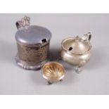 A silver mustard pot with blue glass liner, a fluted salt cellar and another mustard pot, 7.7oz troy