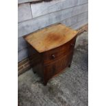 A 19th century bowfront commode, on bracket supports, 24" wide x 16" deep x 27" high, and a mahogany