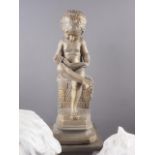 A composition figure of a child reading a book, 16 1/2" high, another composition bust of a child, a