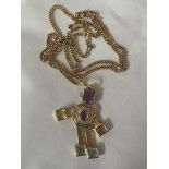 An 18ct gold articulated robot pendant set amethyst, citrine, aquamarine, ruby and diamond, on 18ct