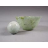 A turned green jade bowl, 4" dia, and a similar green hardstone ball, 1 1/4" dia