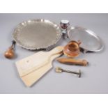 Two 19th century pastry cutters, a horn lemon squeezer, a miniature stoneware jug, a silver plated