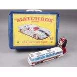 A Dinky Supertoys Vega Major Luxury Coach and a Matchbox Collectors case containing a quantity of