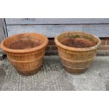 A pair of terracotta pots, 20" dia x 15" high approx