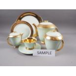 A Limoges "Unique" pattern part coffee set in mint and gold