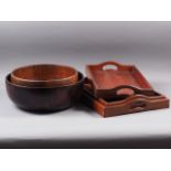 A nest of three Chinese hardwood trays, largest 18 1/2" wide, a lacquered bowl, 13 3/4" dia, and a