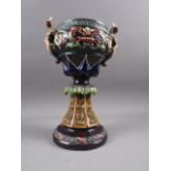 A 19th century Continental Renaissance Revival two-handled vase with satyr masks and scroll