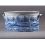 A 19th century Spode blue and white "Lucano" pattern footbath, 20 1/2" wide