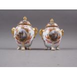 A pair of 19th continental porcelain century two-handled jars and covers, decorated panels with