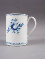 An 18th century Worcester mug with hand-painted floral decoration