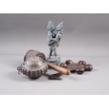 A Far Eastern bronze, figures embracing, 8" high, a prayer wheel, a bronze rattle? and a white metal
